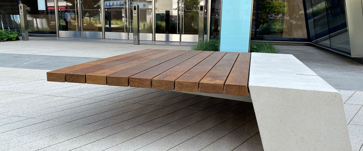 Custom Ipe benches with concrete seatwalls at 200 Park, San Jose