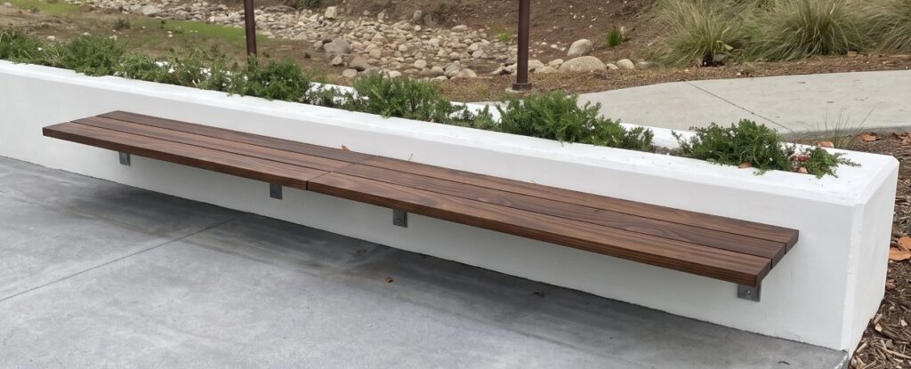 Kebony cantilever wall mounted bench in 26 profile